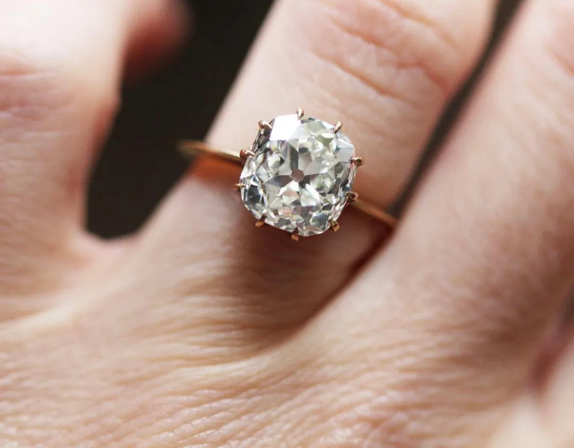 Bell & Bird Scalloped Solitaire on Knife Edge Band