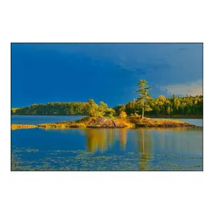 Canada-Ontario-Kenora District Forest Autumn Colors Reflect on Middle Lake at Sunset