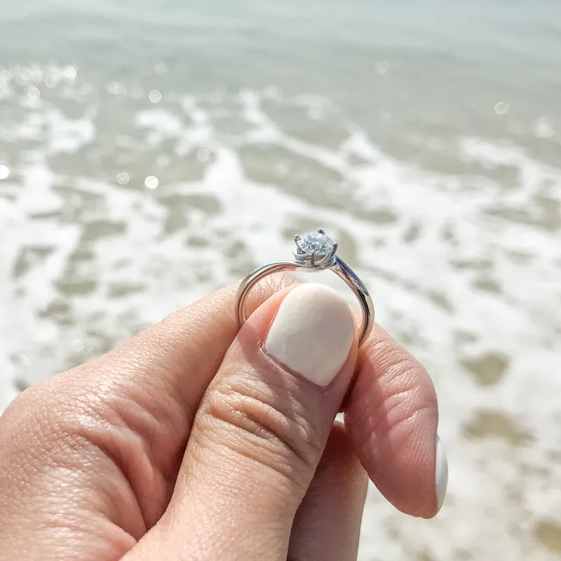 Classic Round Cut Moissanite Twist Shank Solitaire Ring