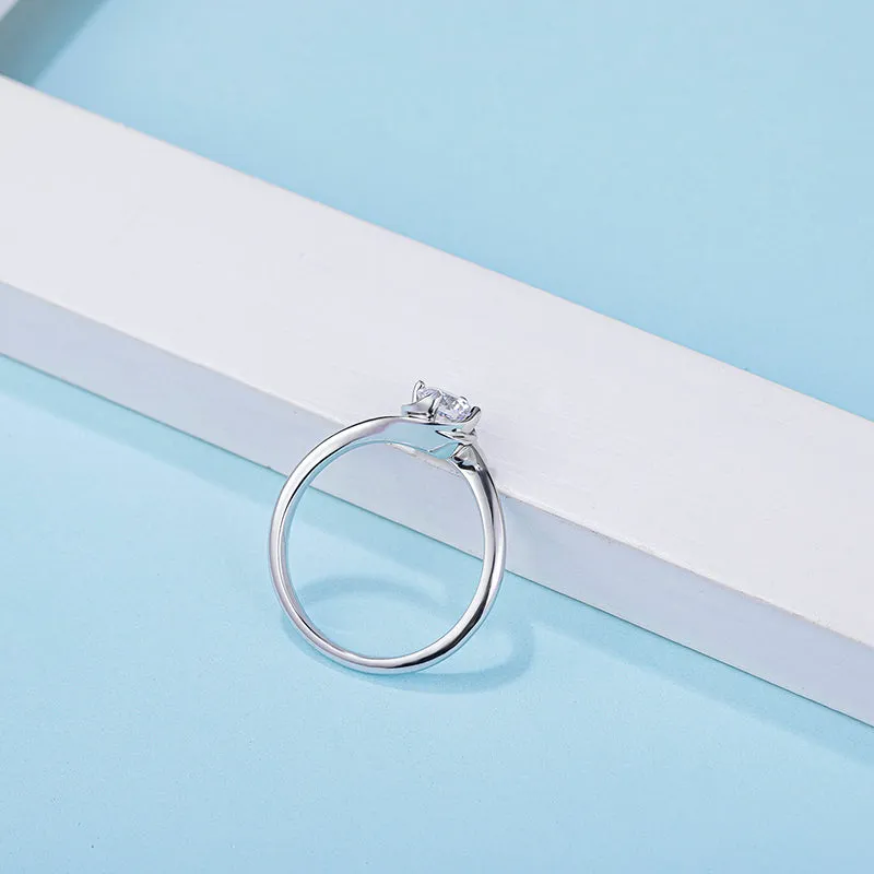 Classic Round Cut Moissanite Twist Shank Solitaire Ring