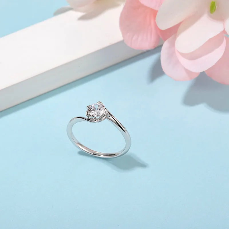 Classic Round Cut Moissanite Twist Shank Solitaire Ring