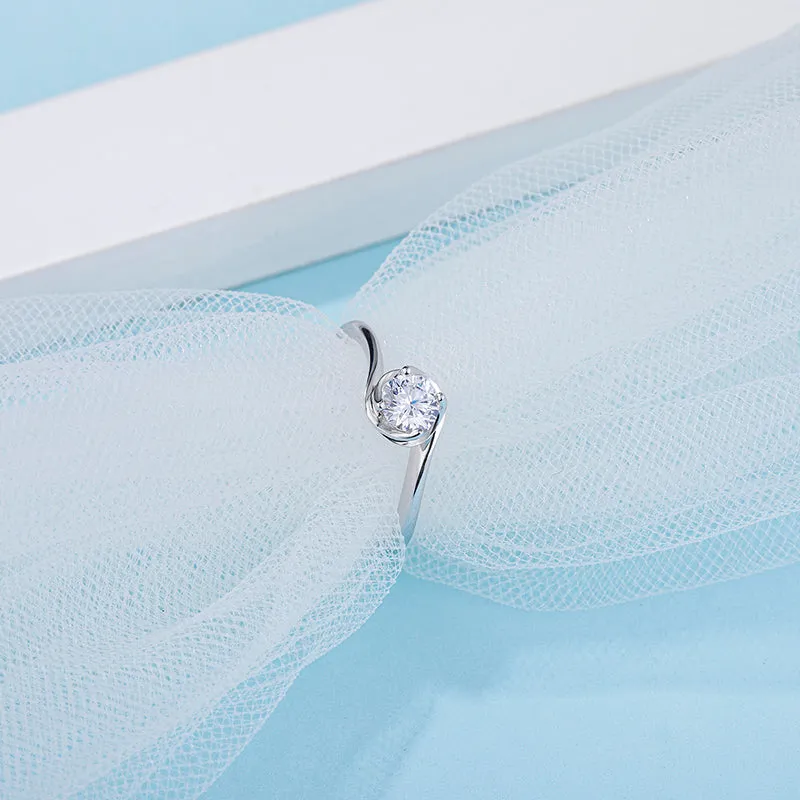 Classic Round Cut Moissanite Twist Shank Solitaire Ring