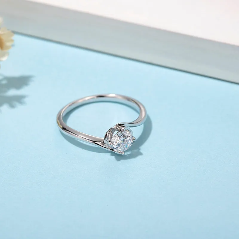 Classic Round Cut Moissanite Twist Shank Solitaire Ring