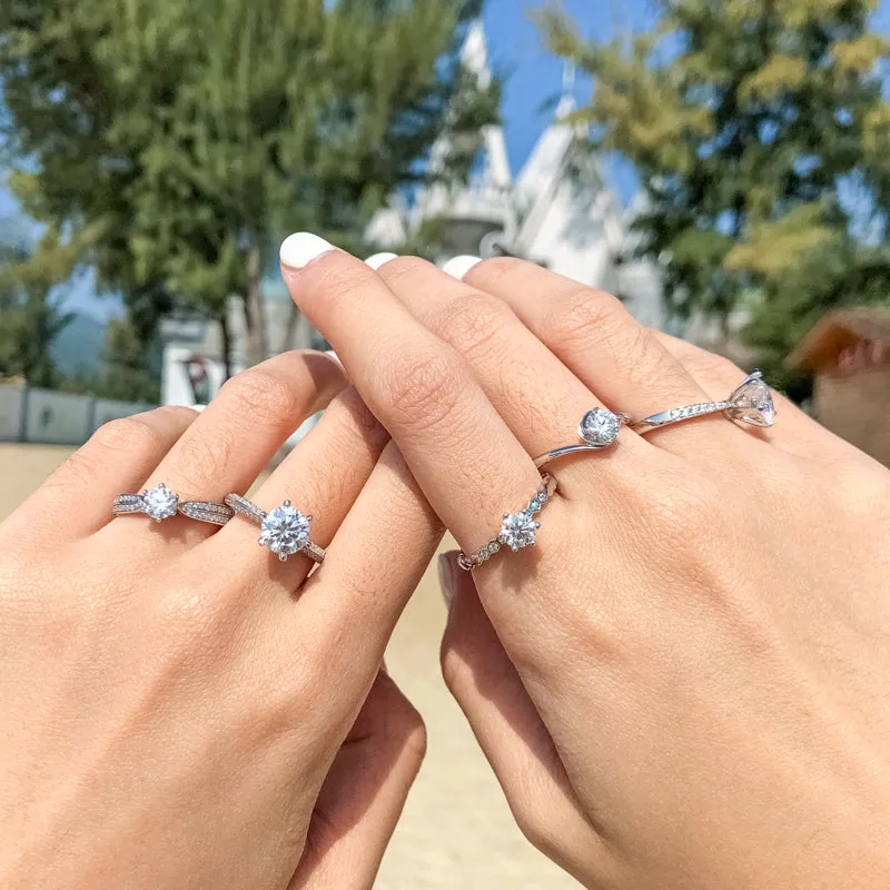 Classic Round Cut Moissanite Twist Shank Solitaire Ring