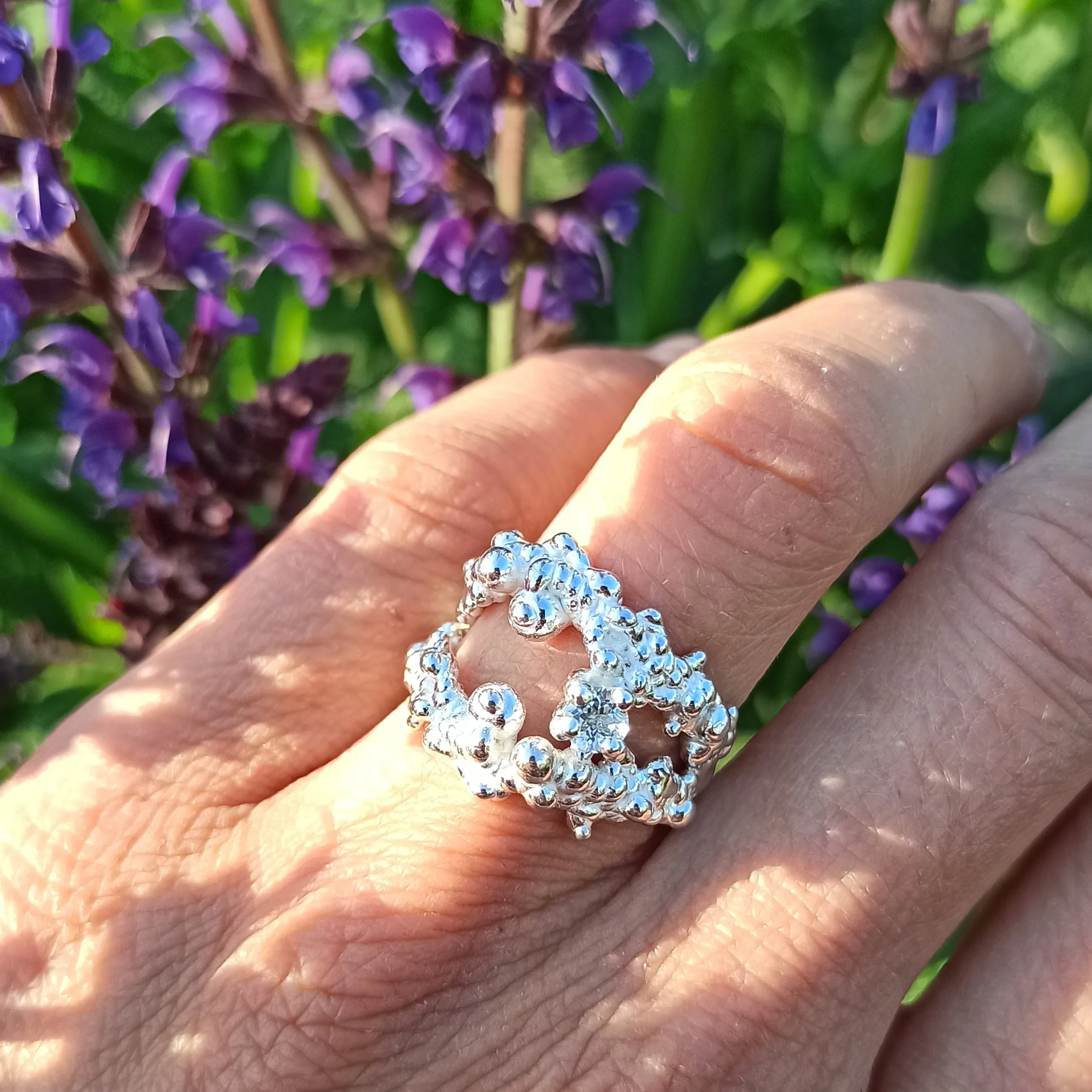 Mammatus Big Silver Ring with White Topaz