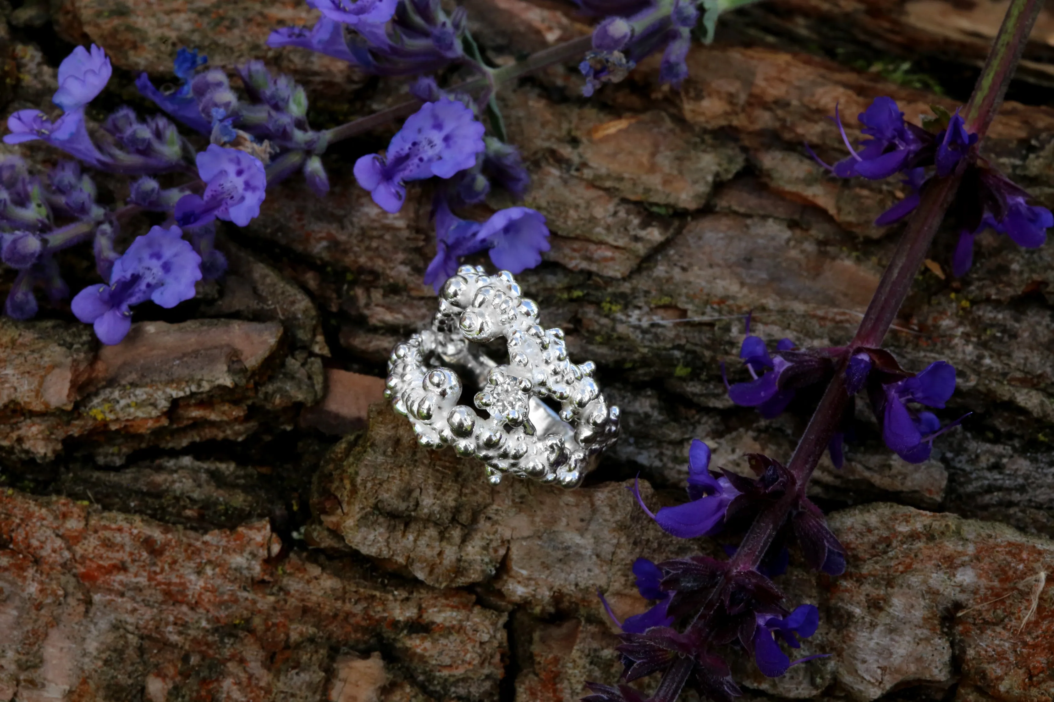 Mammatus Big Silver Ring with White Topaz