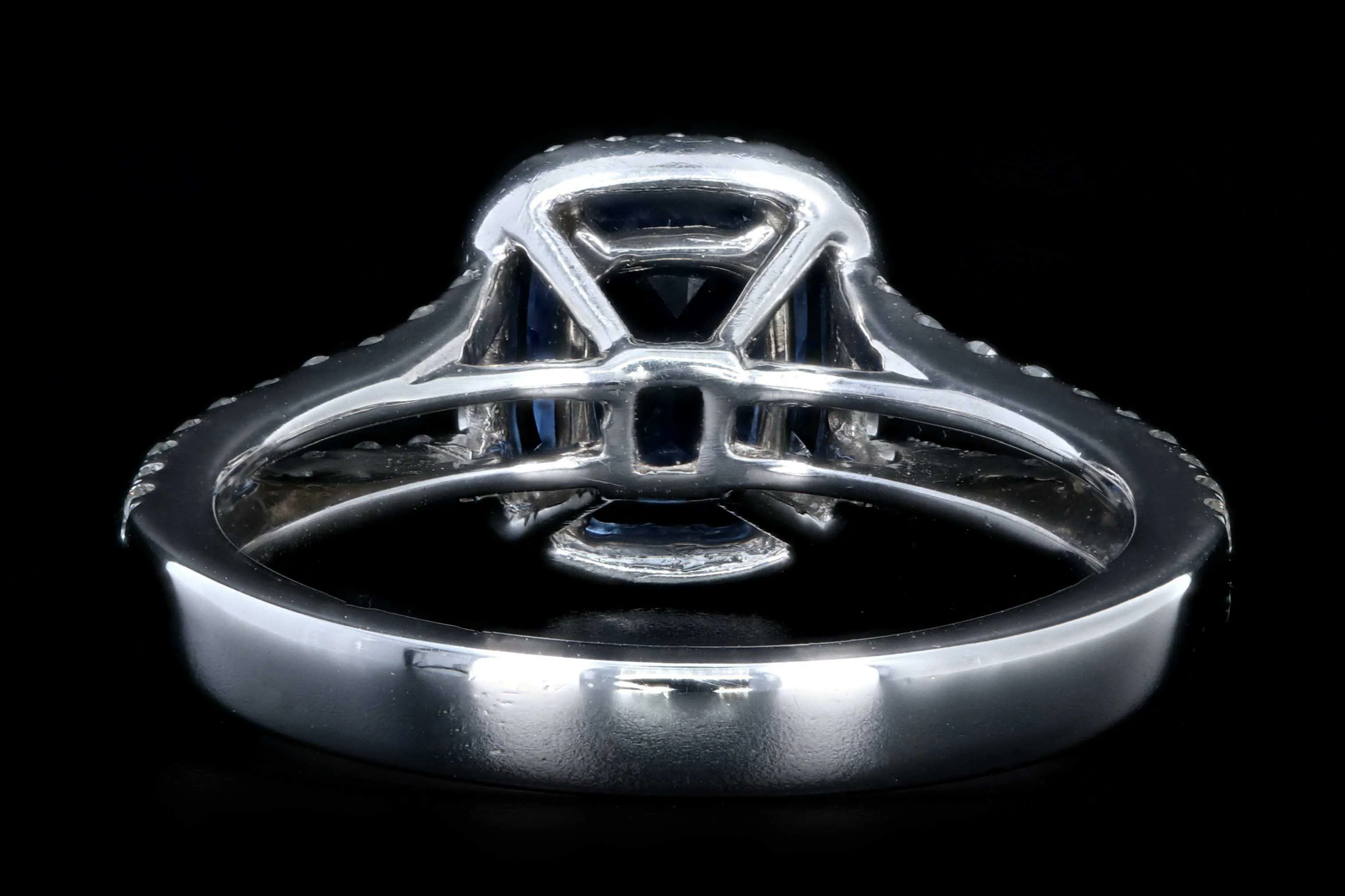 Modern 18K White Gold 1.25 Natural Sapphire and Diamond Halo Ring