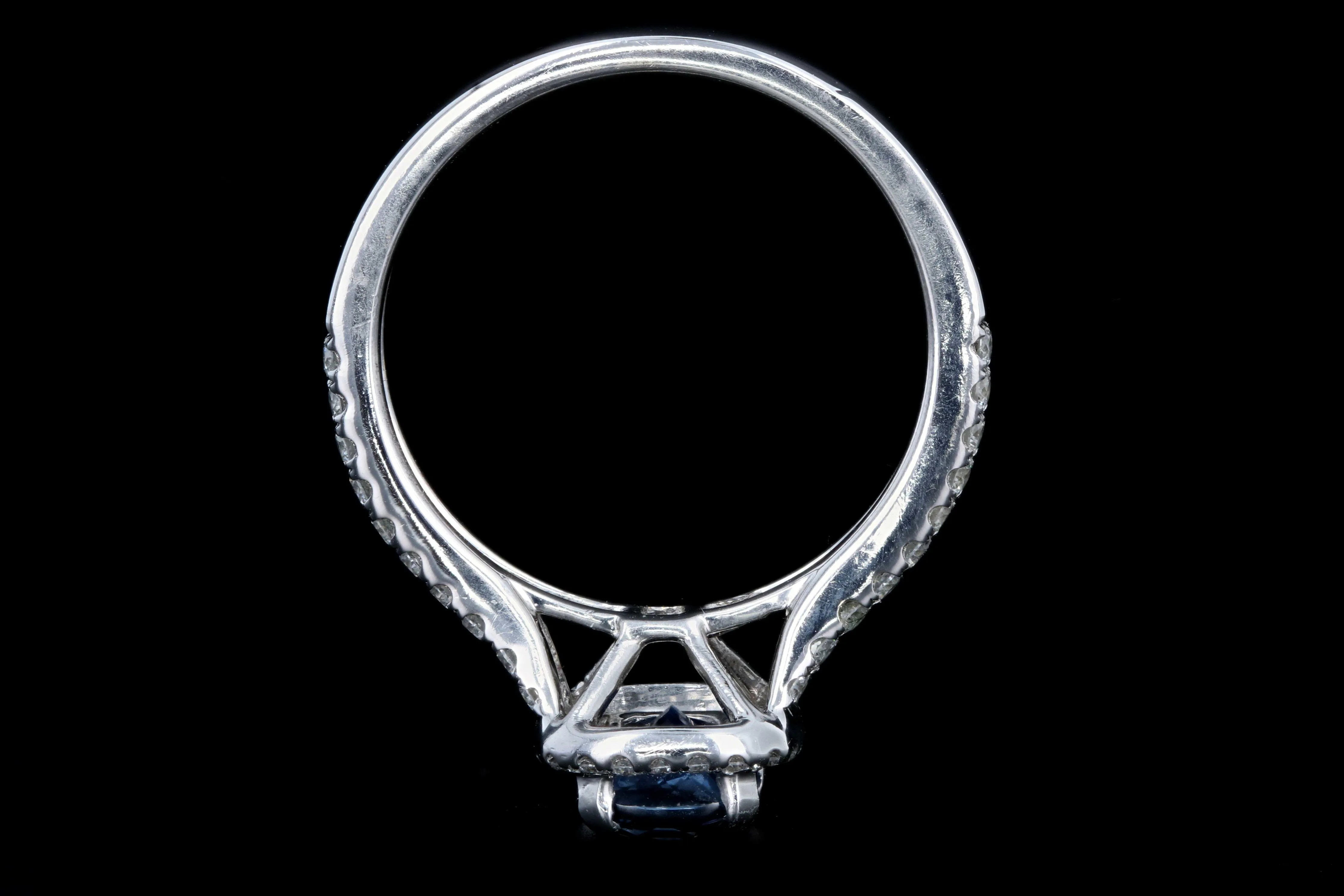 Modern 18K White Gold 1.25 Natural Sapphire and Diamond Halo Ring