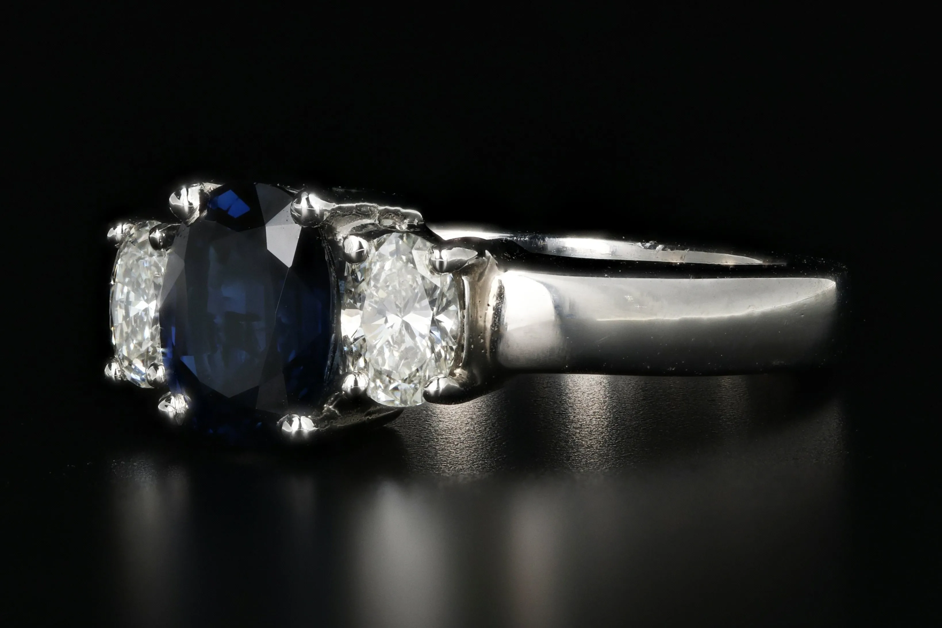 Modern Platinum 1.5 Carat Natural Sapphire and Diamond Ring