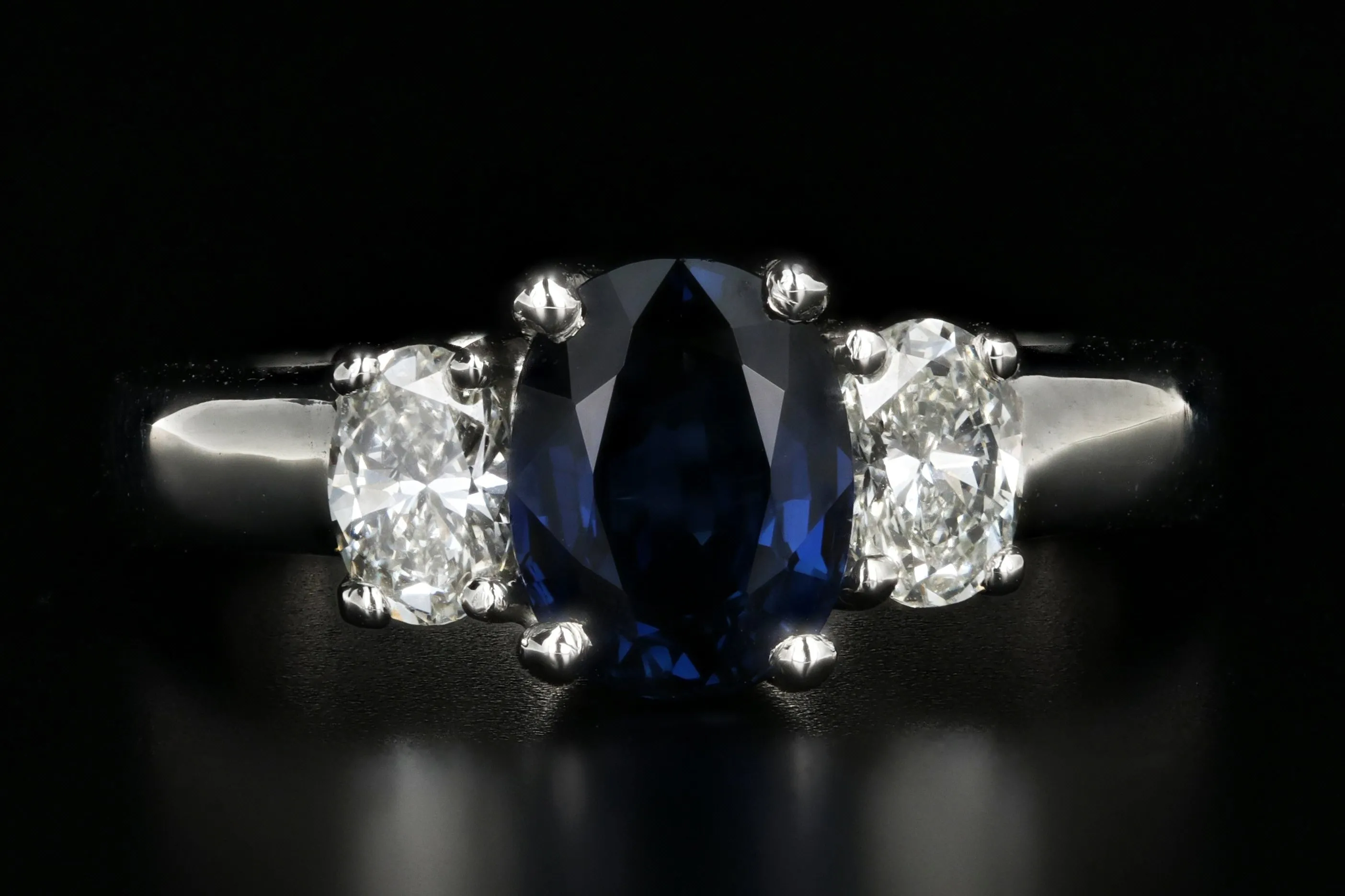 Modern Platinum 1.5 Carat Natural Sapphire and Diamond Ring
