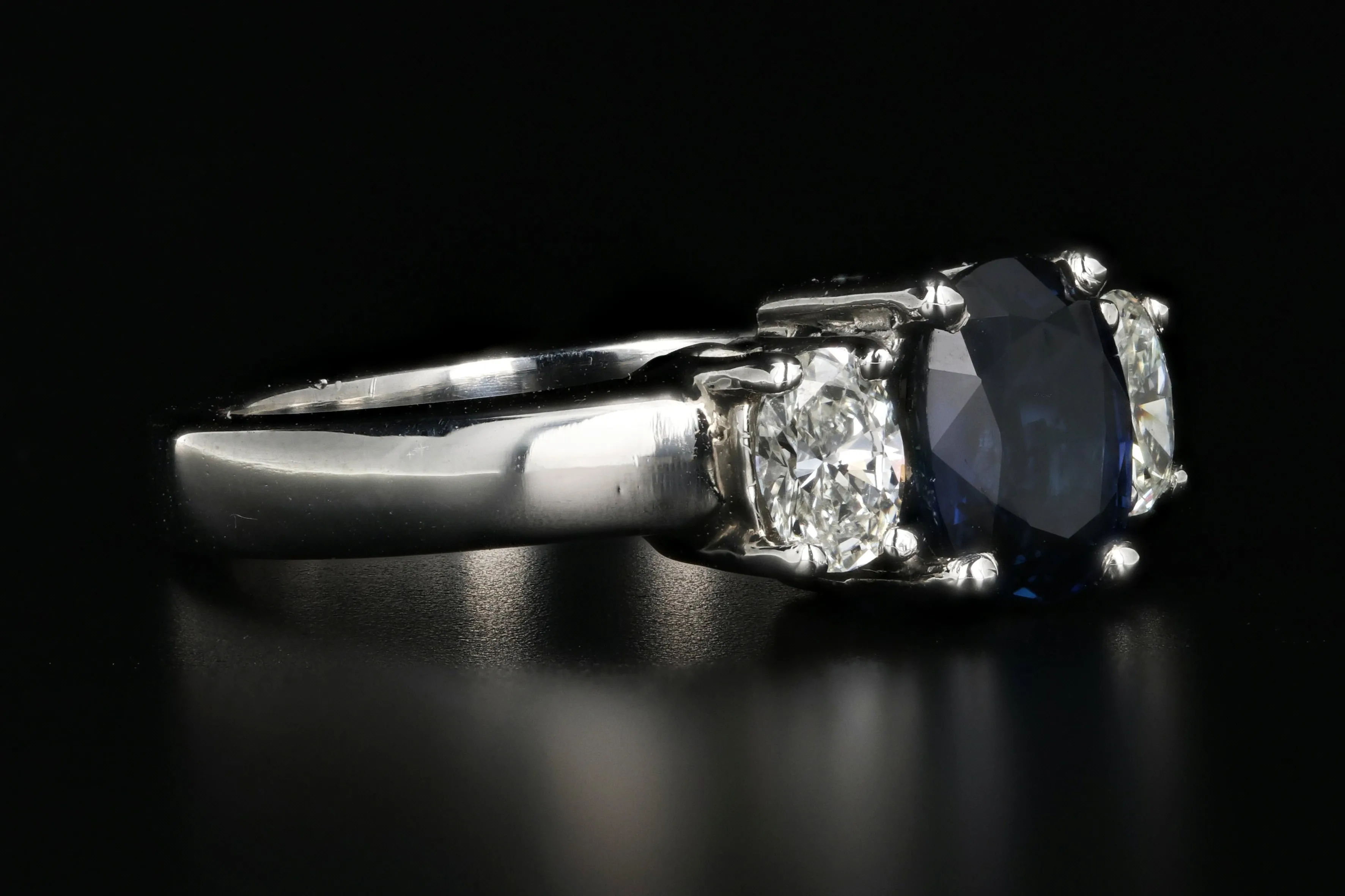 Modern Platinum 1.5 Carat Natural Sapphire and Diamond Ring