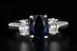 Modern Platinum 1.5 Carat Natural Sapphire and Diamond Ring