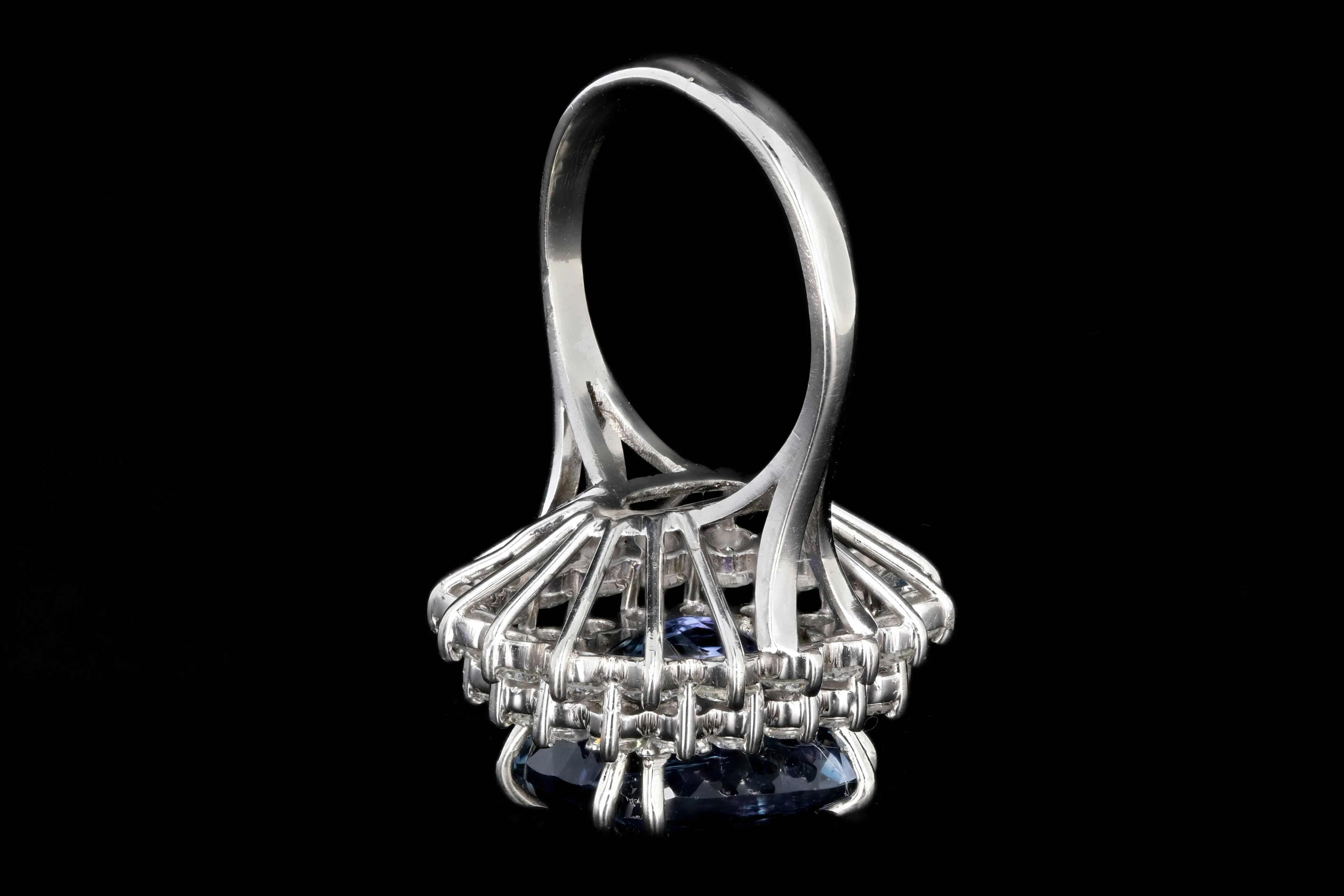 Modern Platinum 9.51 Tanzanite and Diamond Halo Ring