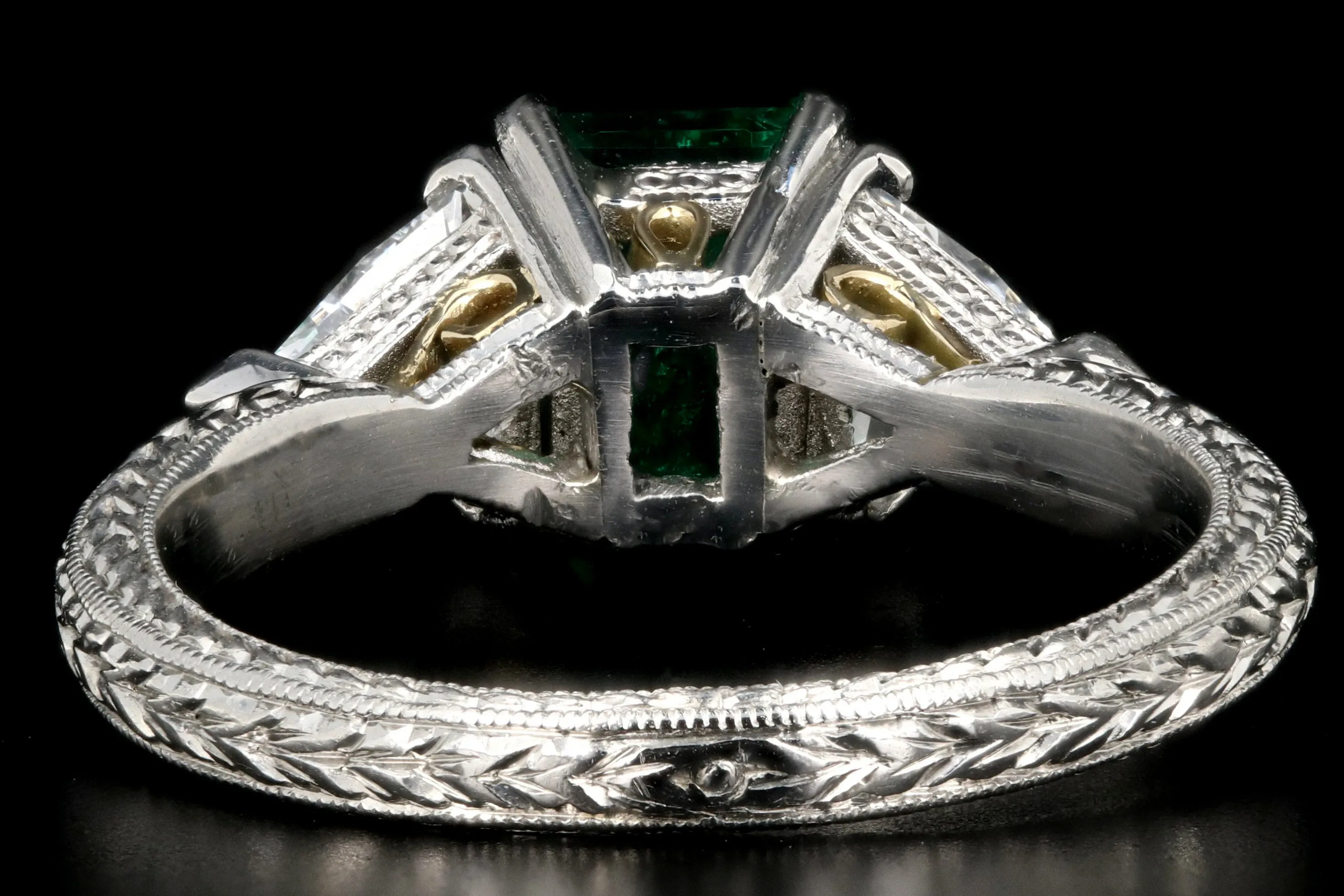 Modern Platinum and 18K Yellow Gold 1 Carat Emerald and Trillion Cut Diamond Ring