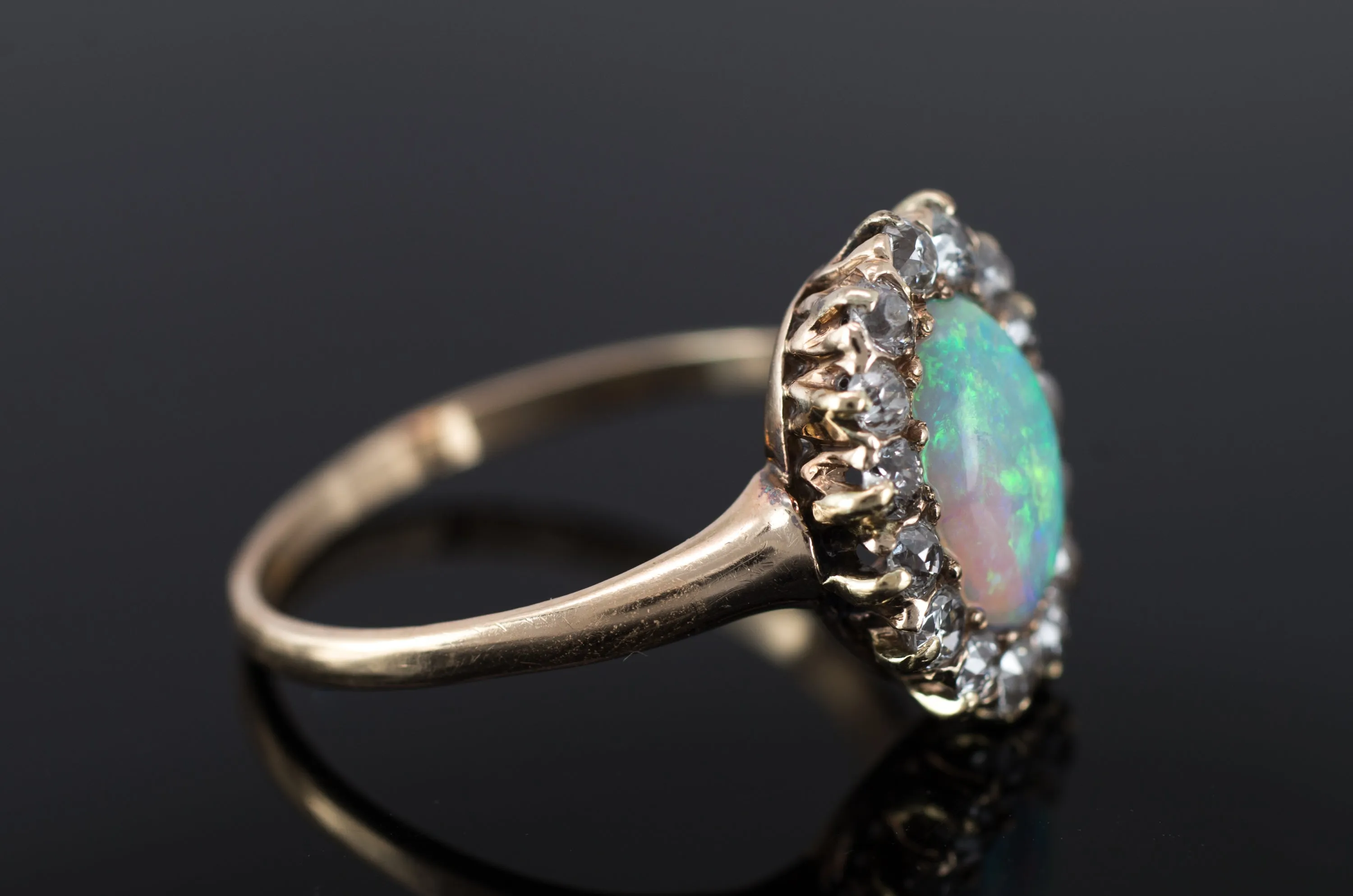 VINTAGE OPAL AND OLD MINE CUT DIAMOND HALO RING