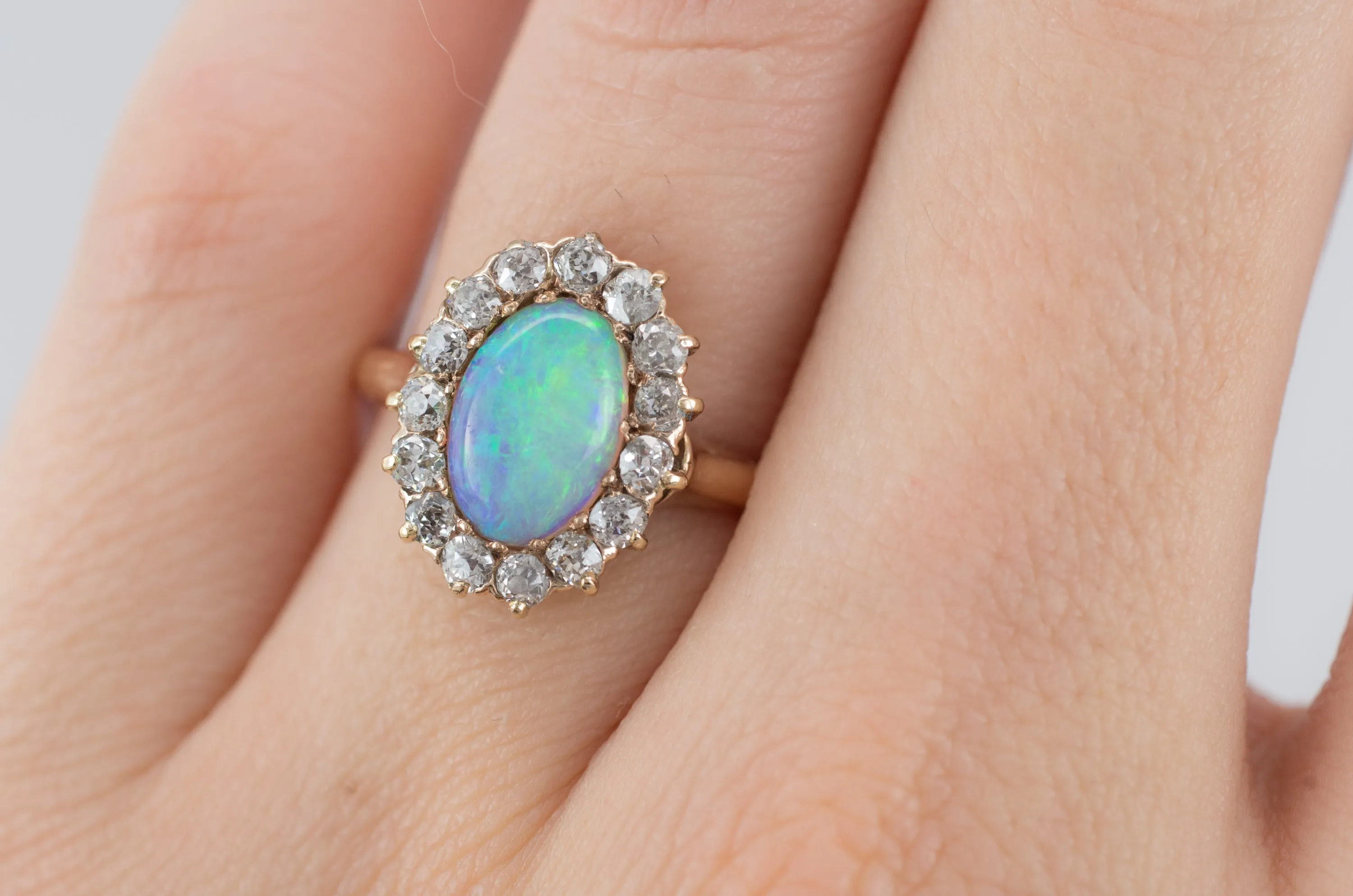 VINTAGE OPAL AND OLD MINE CUT DIAMOND HALO RING