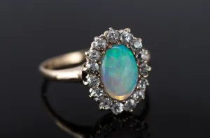 VINTAGE OPAL AND OLD MINE CUT DIAMOND HALO RING