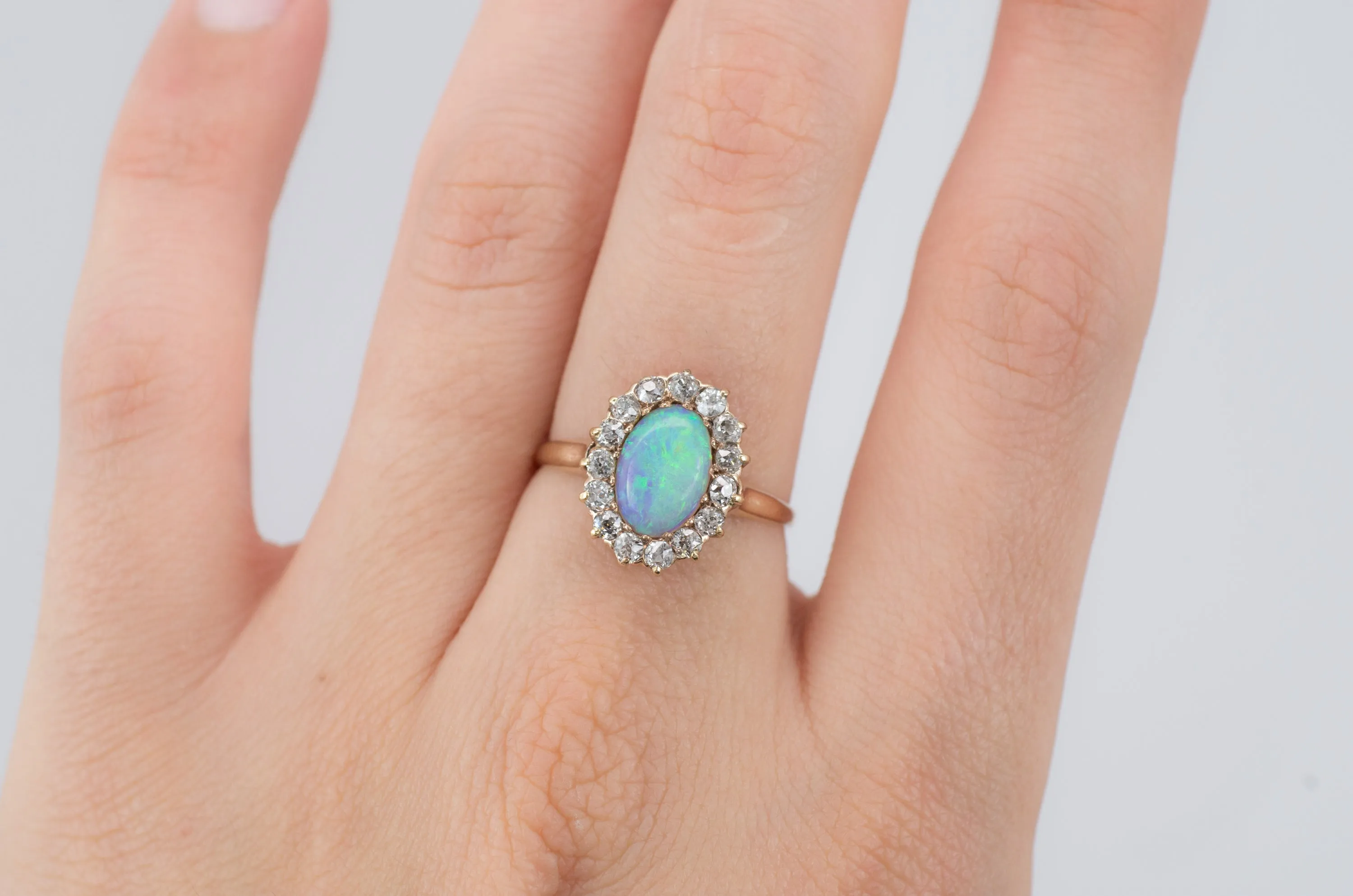 VINTAGE OPAL AND OLD MINE CUT DIAMOND HALO RING