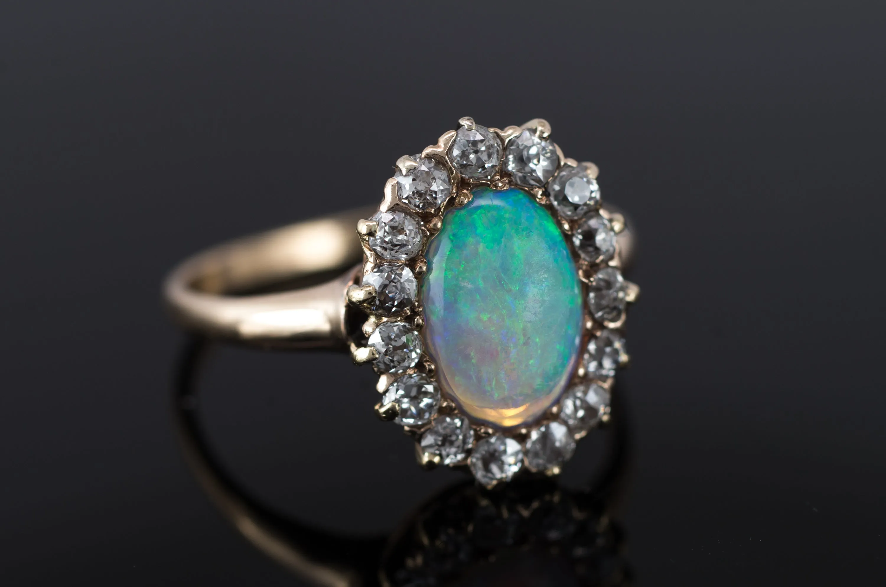 VINTAGE OPAL AND OLD MINE CUT DIAMOND HALO RING