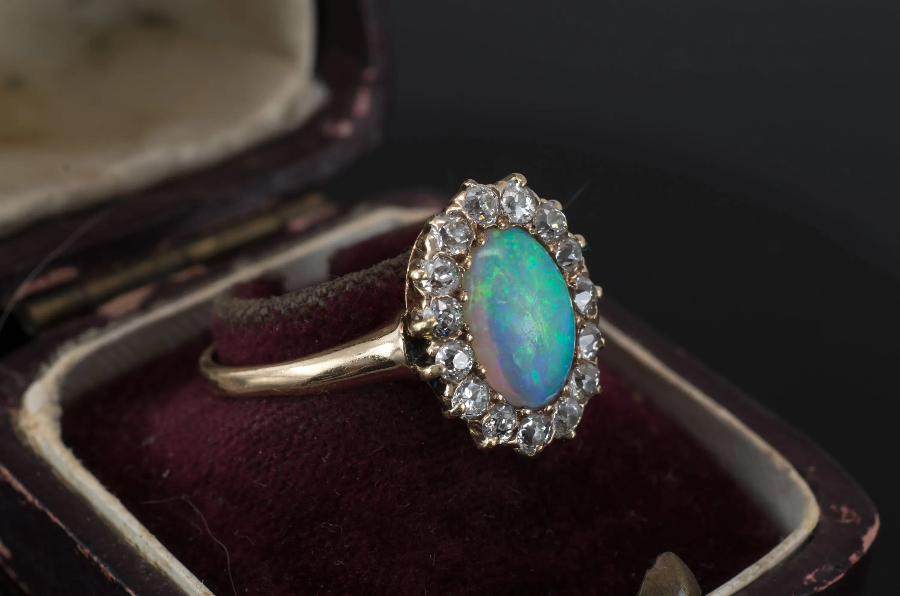 VINTAGE OPAL AND OLD MINE CUT DIAMOND HALO RING