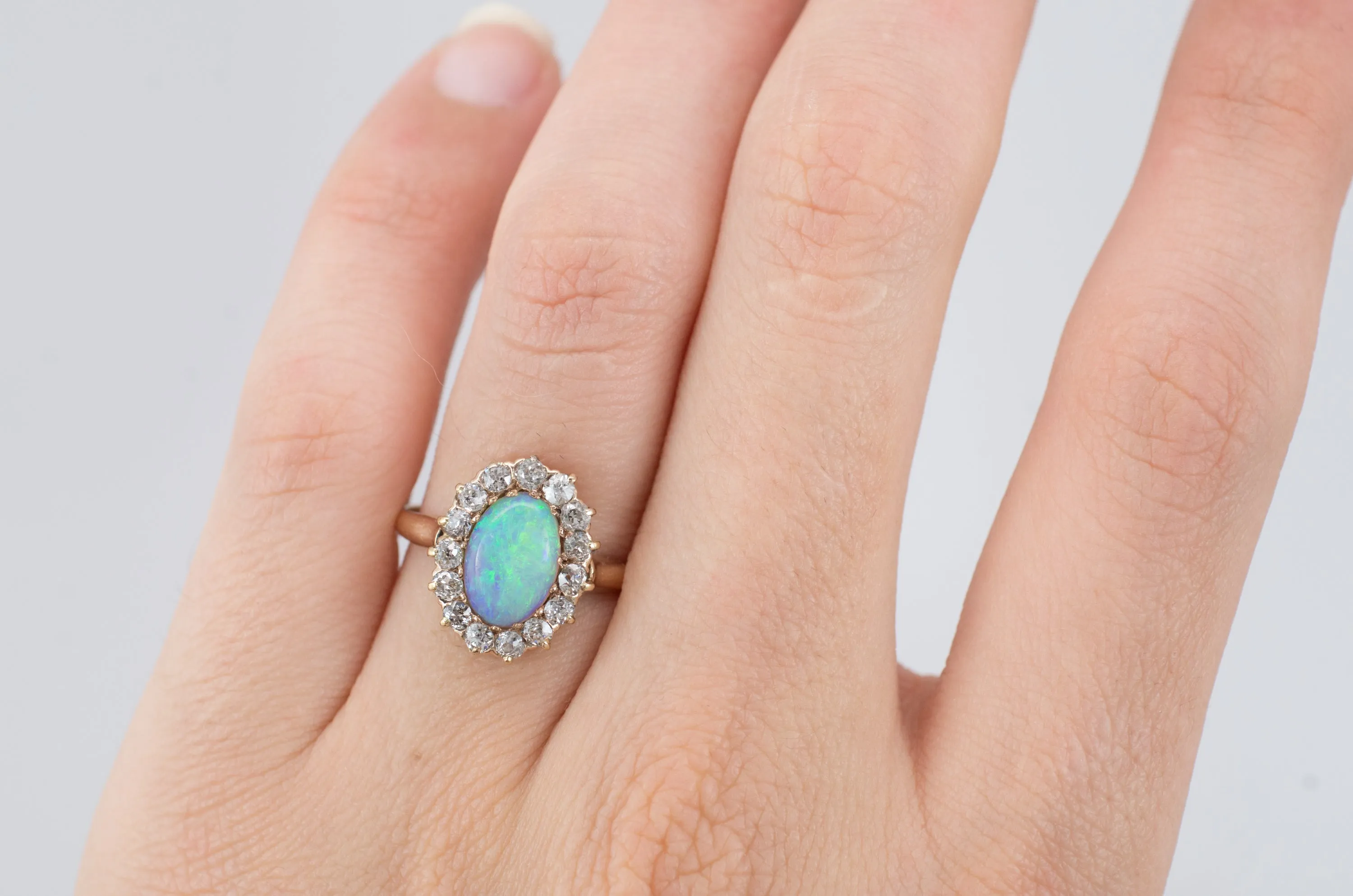 VINTAGE OPAL AND OLD MINE CUT DIAMOND HALO RING