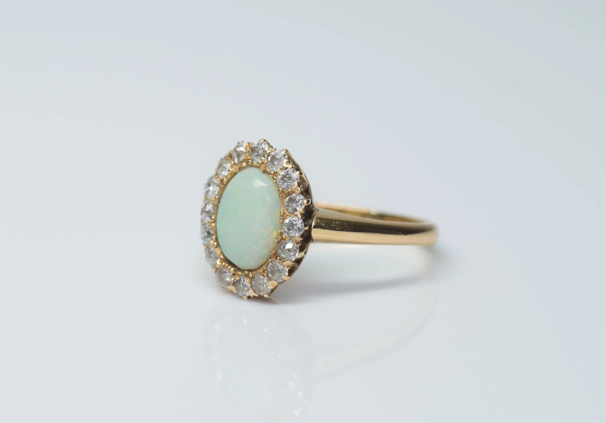 VINTAGE OPAL AND OLD MINE CUT HALO RING