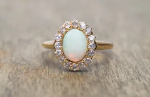 VINTAGE OPAL AND OLD MINE CUT HALO RING