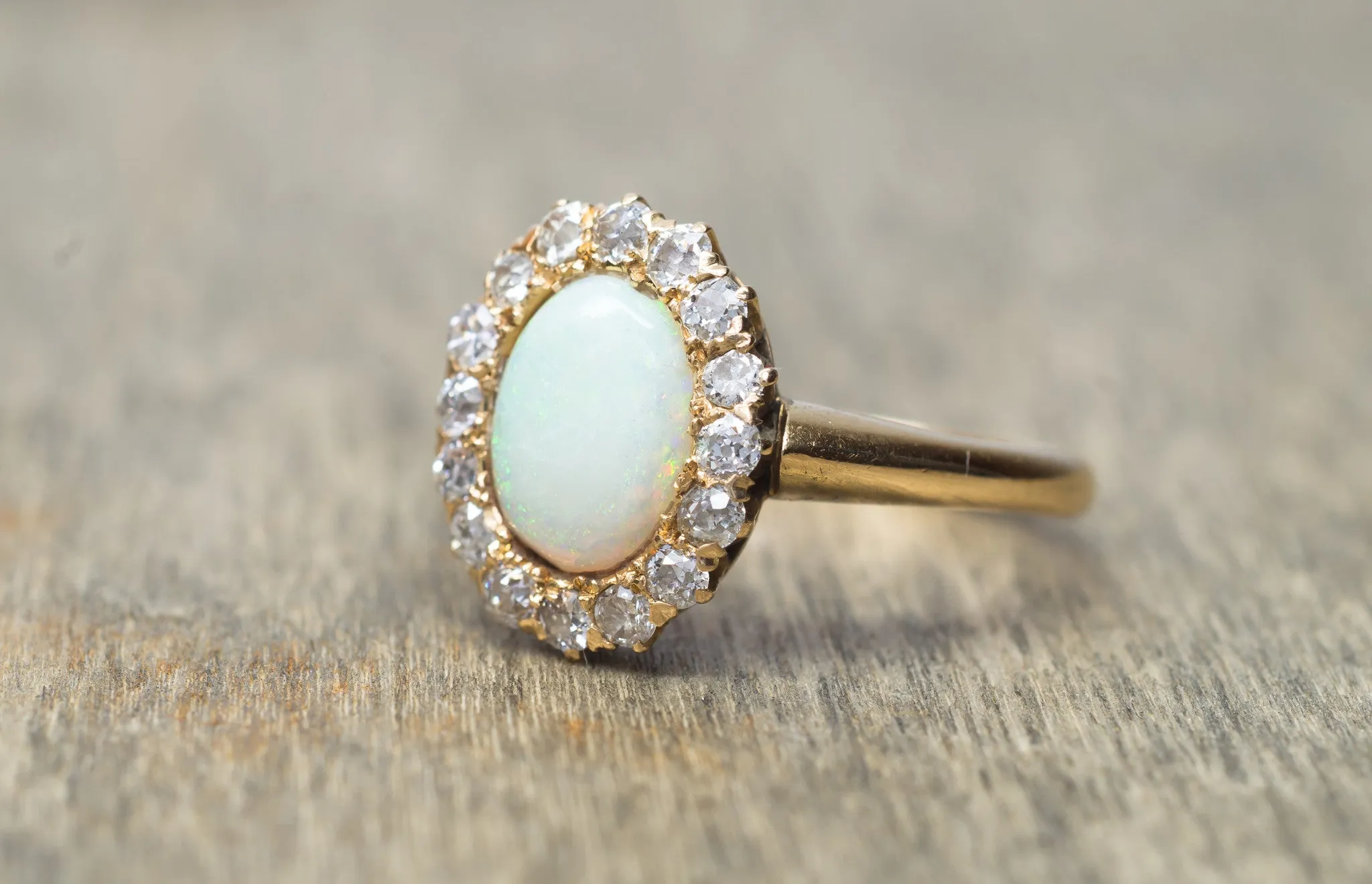 VINTAGE OPAL AND OLD MINE CUT HALO RING