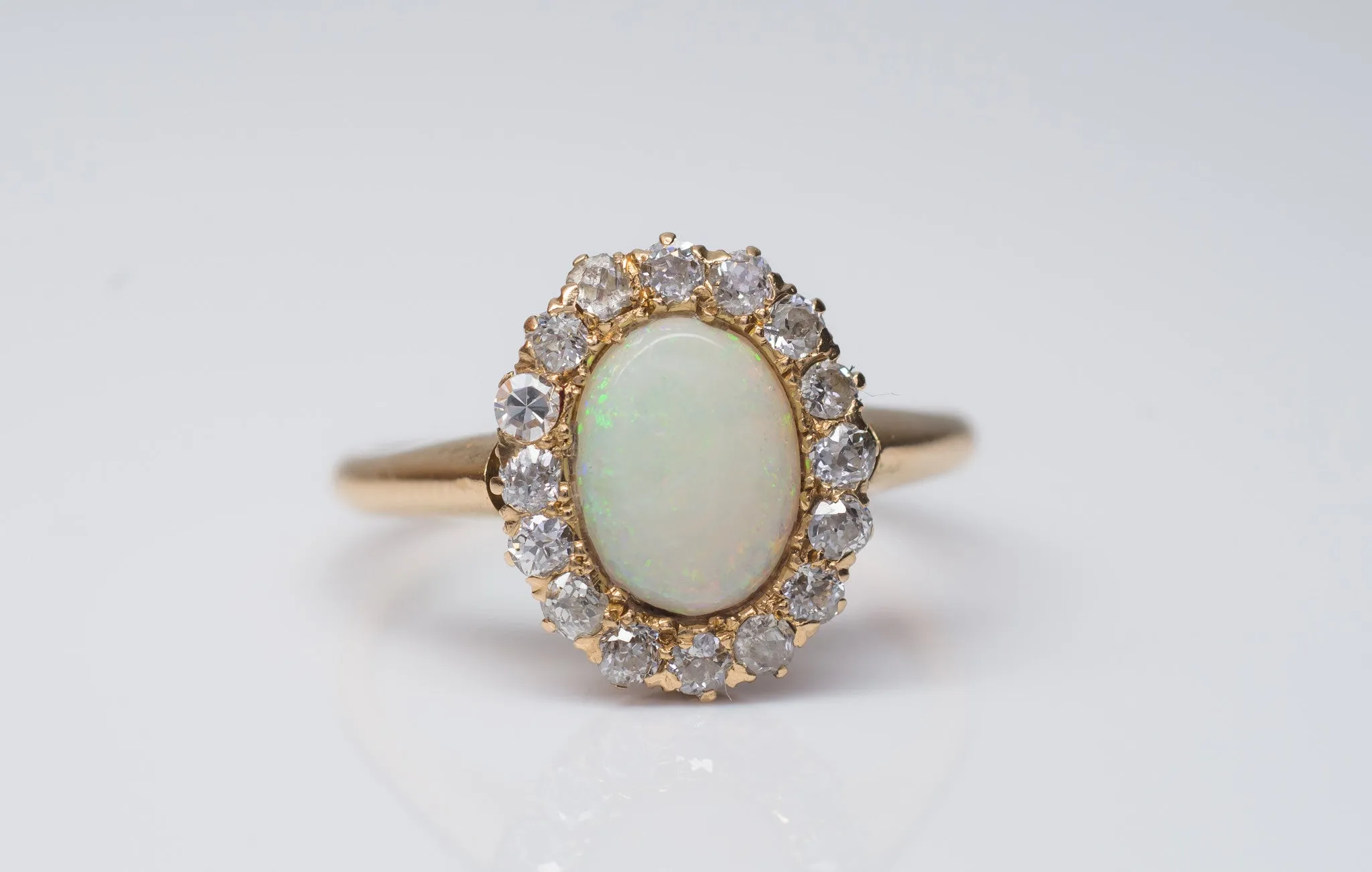 VINTAGE OPAL AND OLD MINE CUT HALO RING