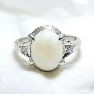 Vintage Oval Opal Ring in White Gold with Diamonds