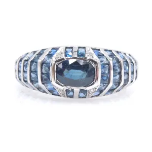 White Gold and Sapphire Bezel and Channel Set Domed Band